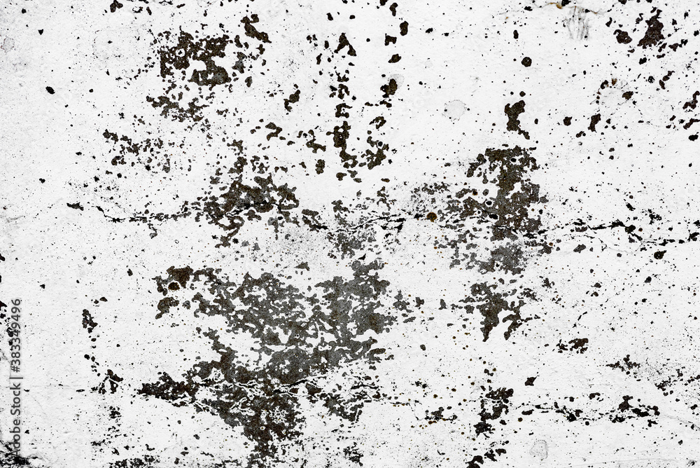 Texture of a concrete wall with cracks and scratches which can be used as a background Texture of a concrete wall with cracks and scratches which can be used as a background
