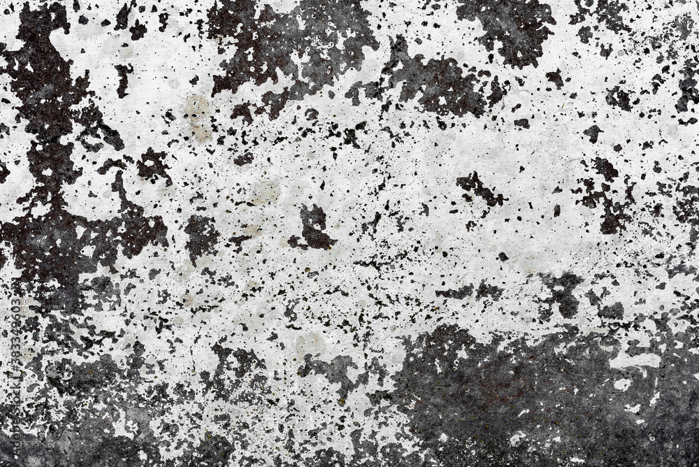 Texture of a concrete wall with cracks and scratches which can be used as a background Texture of a concrete wall with cracks and scratches which can be used as a background