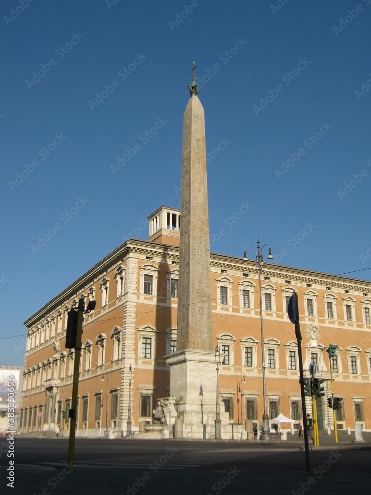 Ancient Egyptian obelisk and building in Rome. Italy. Europe