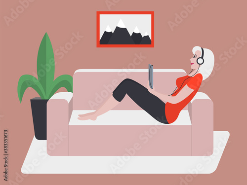 Young woman listening to music on tablet, sitting on sofa in home interior. Beautiful blonde in headphones. Vector concept to illustrate home entertainment, listen to podcast, online education, relax.