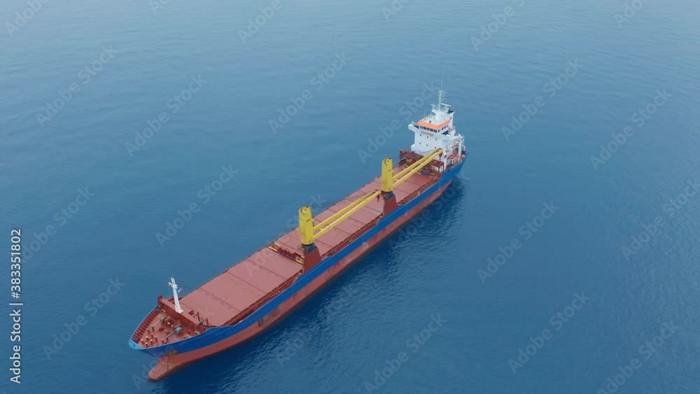 Aerial view. Cargo ship on the open sea. Aerial view. Cargo ship on the open sea.