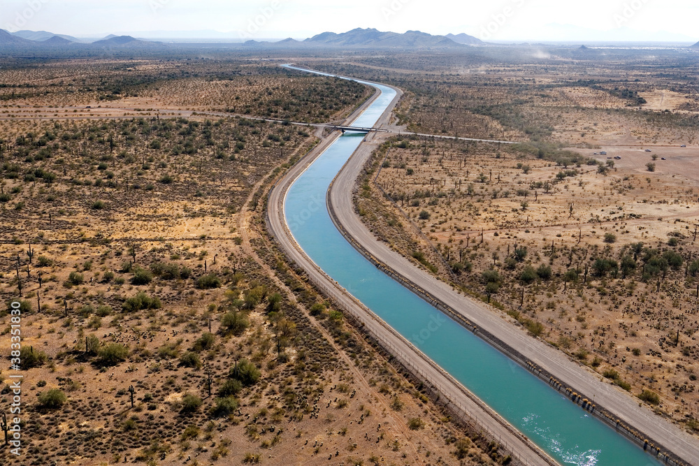 Irrigation canal winding thru the Arizona desert