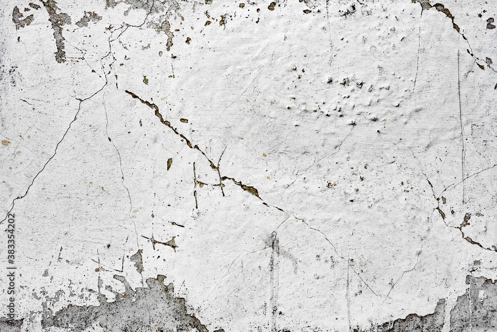 Obraz premium Texture of a concrete wall with cracks and scratches which can be used as a background
