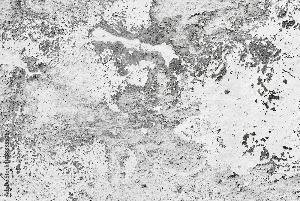 Texture of a concrete wall with cracks and scratches which can be used as a background Texture of a concrete wall with cracks and scratches which can be used as a background