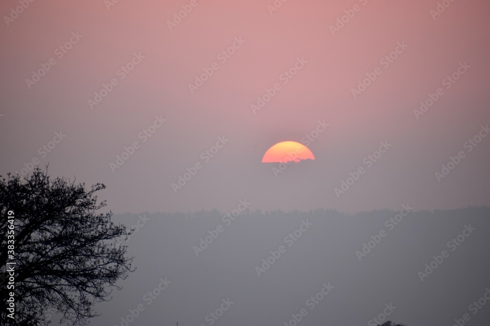 sunset in the sky,sunset over the hills sunset in the sky,sunset over the hills