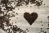 heart made of coffee beans on the table. coffee love concept