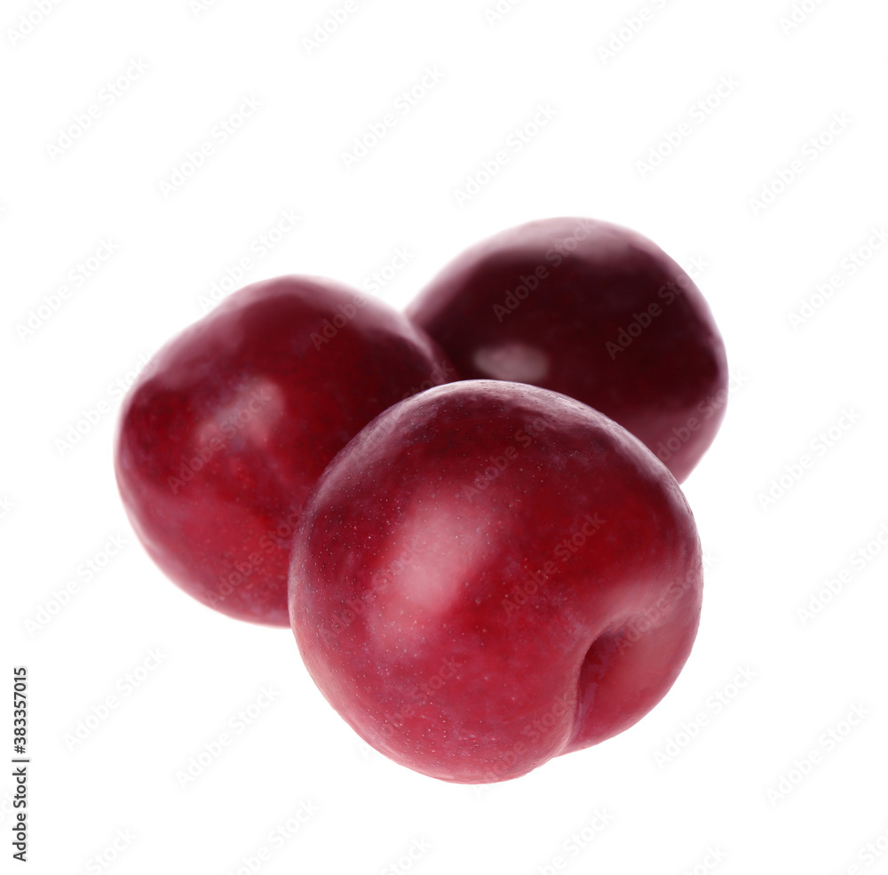 Delicious fresh ripe plums isolated on white