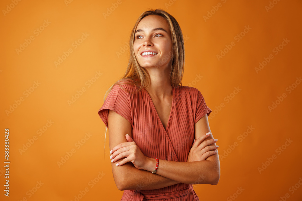 Obraz premium Portrait of a young beautiful happy woman smiling