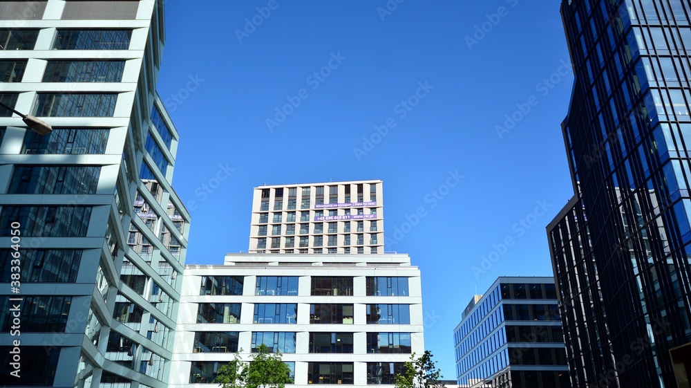 Fototapeta premium Fragment facade of a modern office building with glazing, perspective. 
