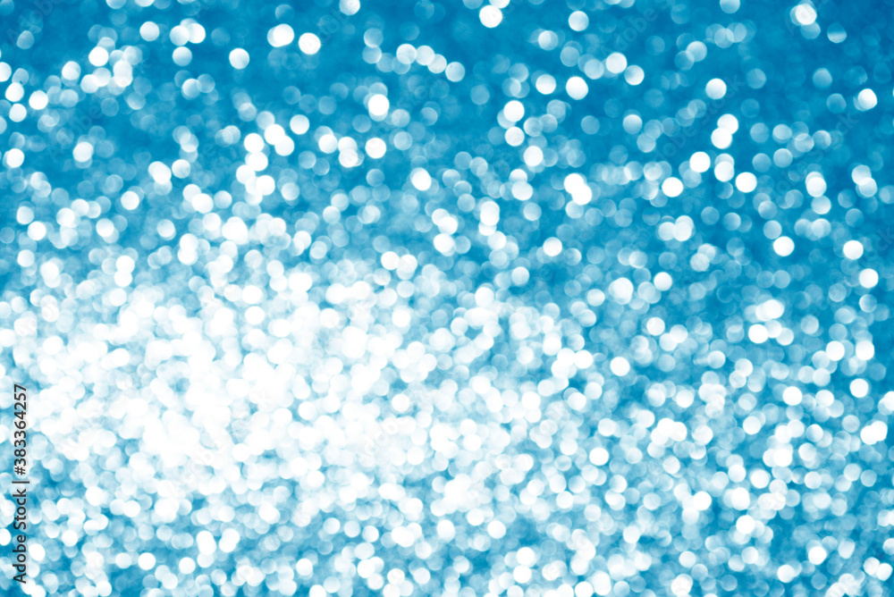 blue white glittering Christmas lights. Blurred abstract background blue white glittering Christmas lights. Blurred abstract background