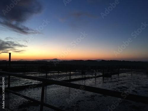 sunrise over a farm