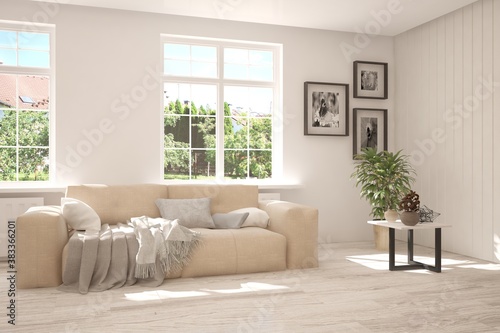 White living room with sofa and summer landscape in window. Scandinavian interior design. 3D illustration