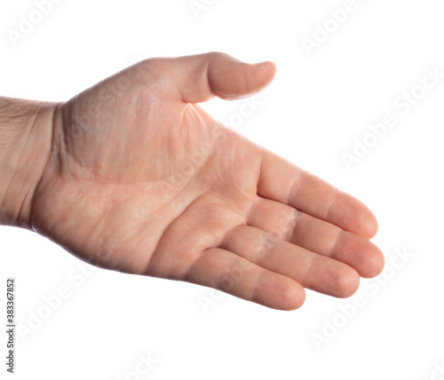 close-up of a male hand with an open palm ready to greet with a handshake on a white background,