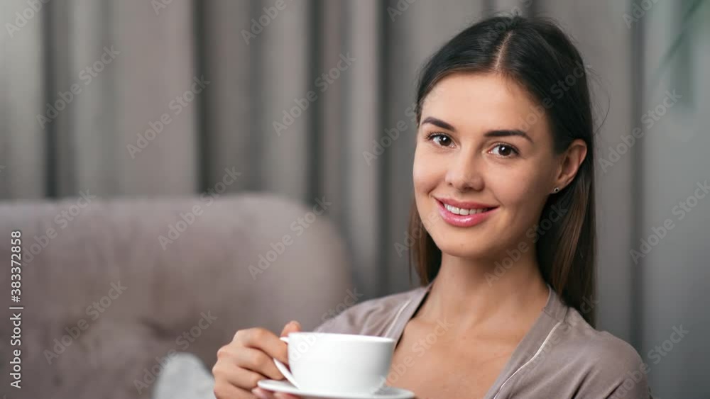Portrait of domestic female posing holding cup of coffee. Medium close up shot on 4k RED camera Portrait of domestic female posing holding cup of coffee. Medium close up shot on 4k RED camera