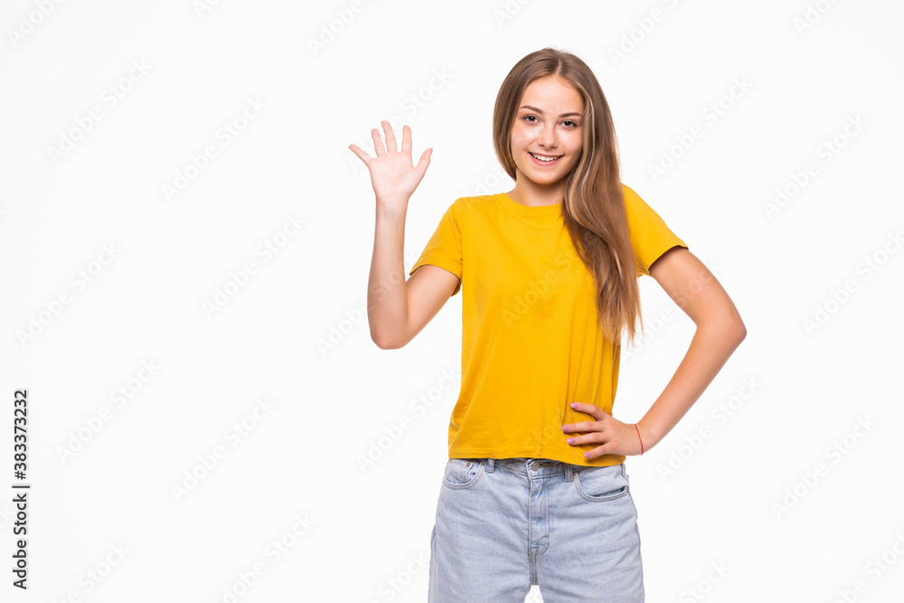 Smiling young woman with waving hand, business, education, office, greeting concept standing over white isolated background Smiling young woman with waving hand, business, education, office, greeting concept standing over white isolated background