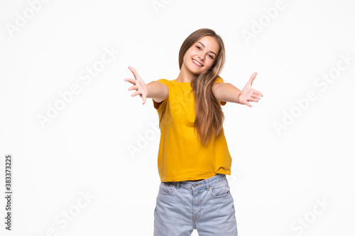 Young friendly woman with an open hand ready for hugging
