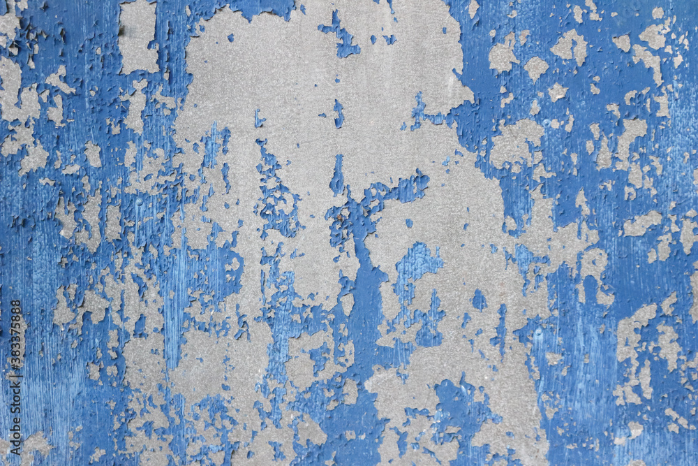 Old Damaged metallic Surface with Peeling Paint Pieces.