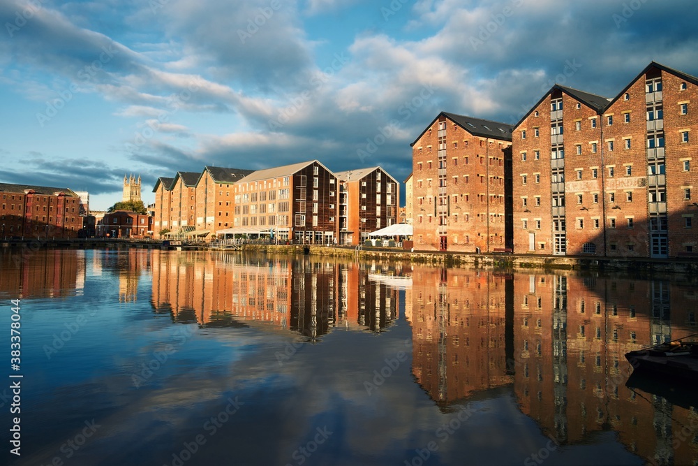 Fototapeta premium Gloucester Quays warehouses reflected in the canal
