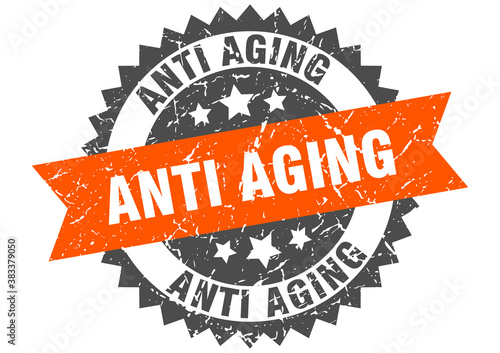 anti aging stamp. grunge round sign with ribbon