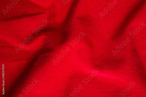 Obraz na płótnie clothing items stonewashed red cotton fabric texture with seams, clasps, buttons