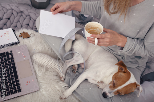 DIY Craft Project and for New, Year, Christmas or Birthdays. Cozy style weared woman watching how-to guide on laptop