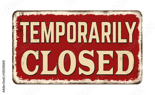 Temporarily closed vintage rusty metal sign