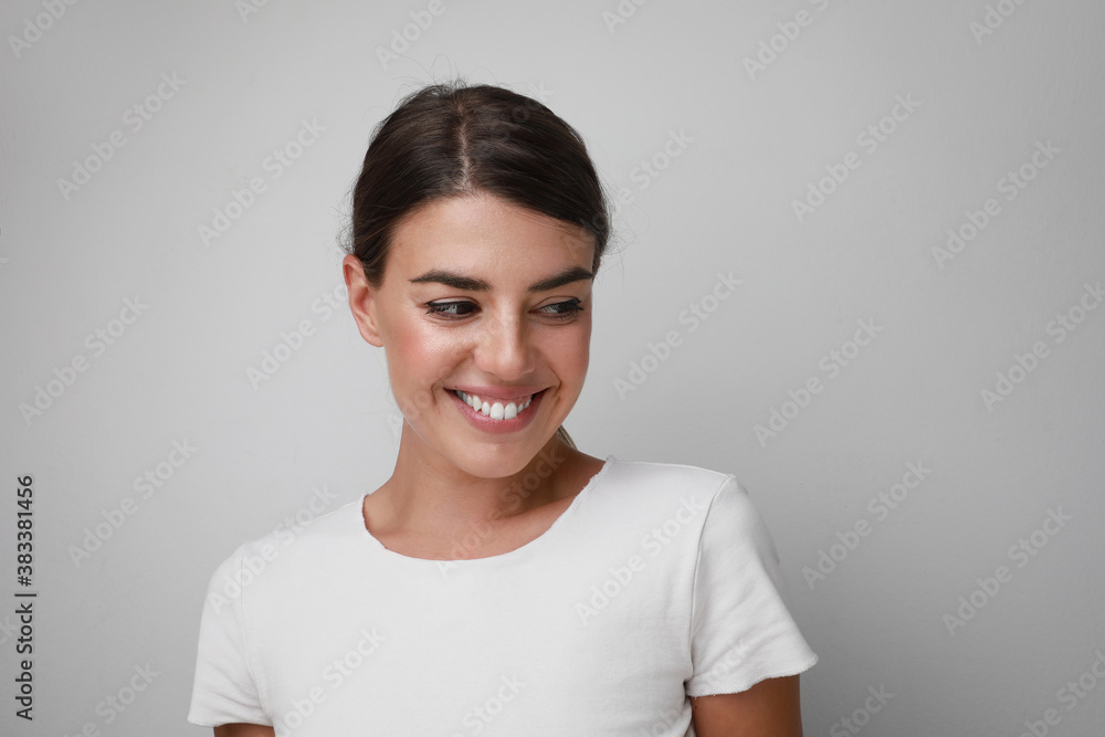 Beautiful young pretty thinking thoughtful woman posing isolated over white wall background. Space for text. Beautiful young pretty thinking thoughtful woman posing isolated over white wall background. Space for text.