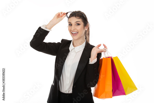 super excited woman holding shopping bags eyeglasses up