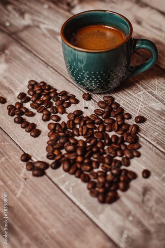  cup of coffee and coffee beans