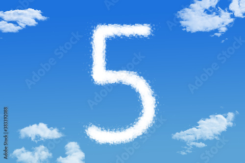 cloud shape of number five on blue sky