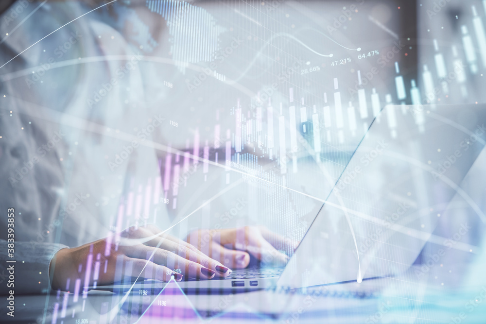 Double exposure of woman hands working on computer and forex graph hologram drawing. Financial analysis concept. Double exposure of woman hands working on computer and forex graph hologram drawing. Financial analysis concept.