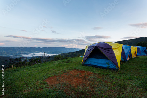 A tent traveling on top of a mountain