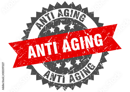 anti aging stamp. grunge round sign with ribbon