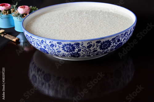 Wallpaper Mural A bowl of sticky rice soak in the water Torontodigital.ca