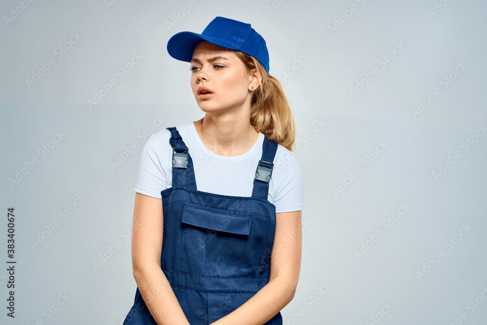 Working woman in uniform courier delivery service lifestyle Working woman in uniform courier delivery service lifestyle