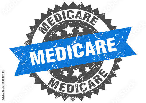 medicare stamp. grunge round sign with ribbon