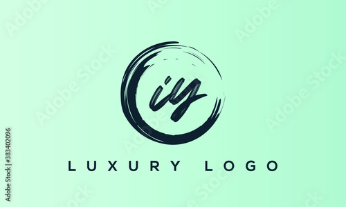 Letter IY handwriting logo with a beautiful template photo