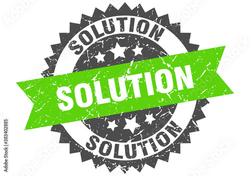 solution stamp. grunge round sign with ribbon