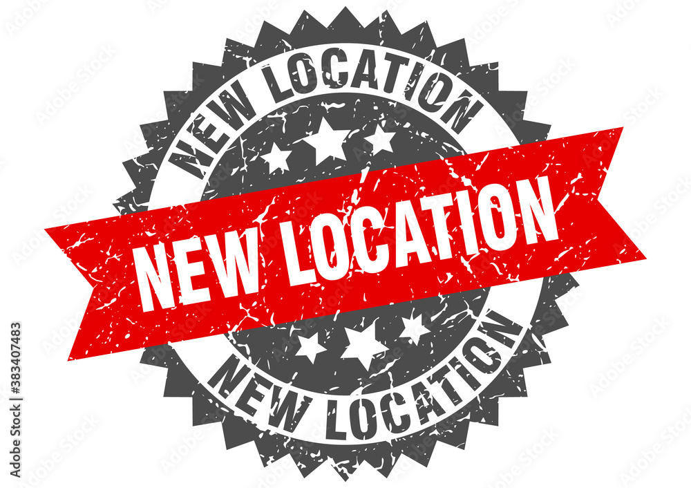 Obraz premium new location stamp. grunge round sign with ribbon