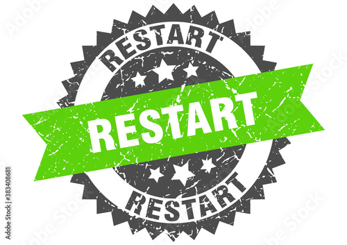 restart stamp. grunge round sign with ribbon