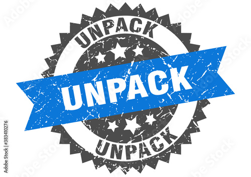 unpack stamp. grunge round sign with ribbon