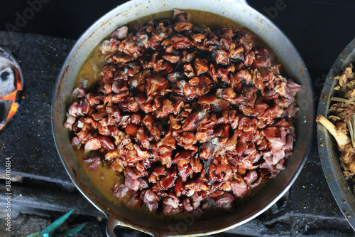 The process of cooking tongseng using a stove in close up, tongseng is traditional food from central java indonesia. thera are tongseng goat beef or chicken