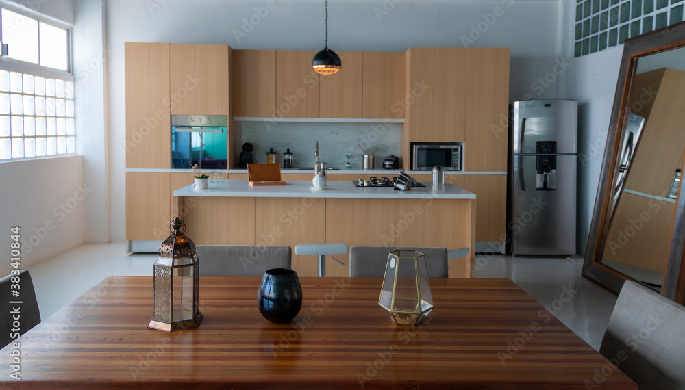 Contemporary white kitchen with island, in blue and beige tones. Interior design Contemporary white kitchen with island, in blue and beige tones. Interior design