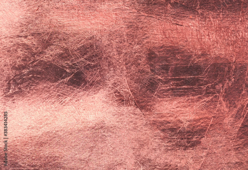 Pink gold background. Texture of gold metal