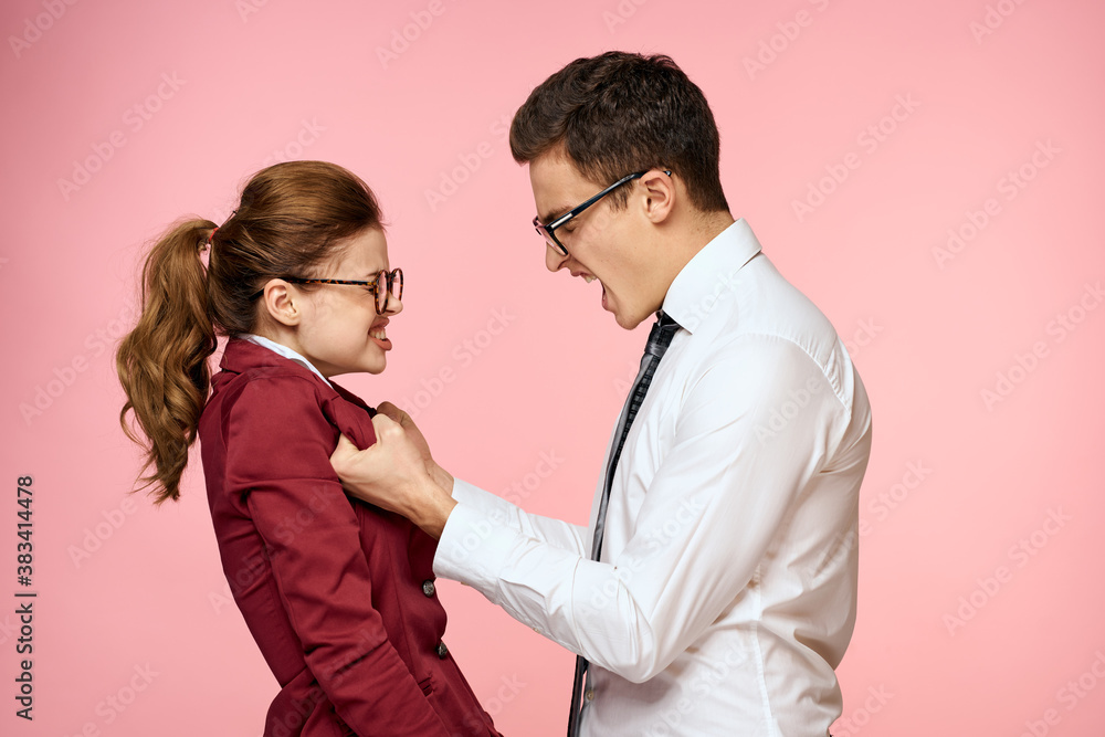 business man and woman office work colleagues team office management studio pink background