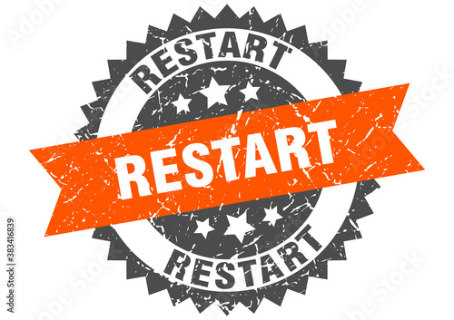 restart stamp. grunge round sign with ribbon