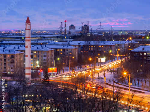 The model of the rocket as a monument on Cosmic Avenue in the city of Omsk.