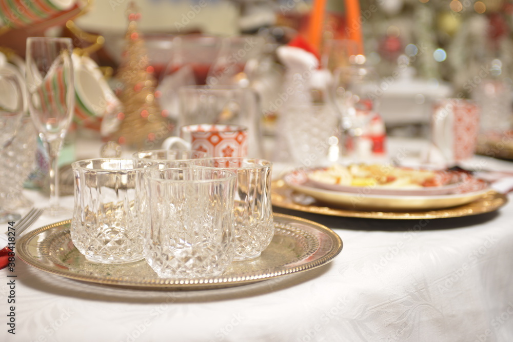 High class new years dinner table set with ornaments with antipasto High class new years dinner table set with ornaments with antipasto
