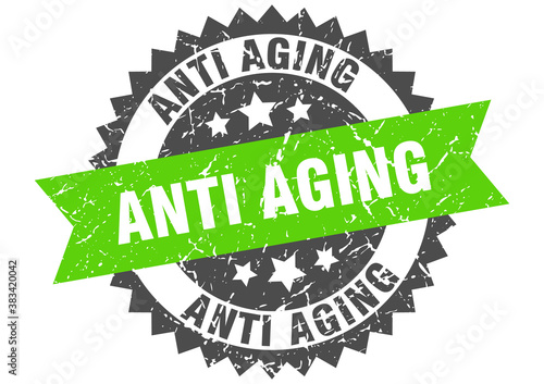 anti aging stamp. grunge round sign with ribbon