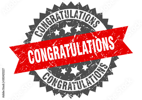 congratulations stamp. grunge round sign with ribbon